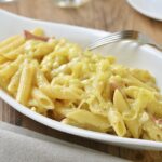 Mac and Cheese: Creamy and cheesy Mac and Cheese in a bowl.